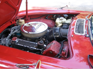 Illustration for article titled Oh Holy Hell, It's A V-8-Powered Volvo P1800 Convertible